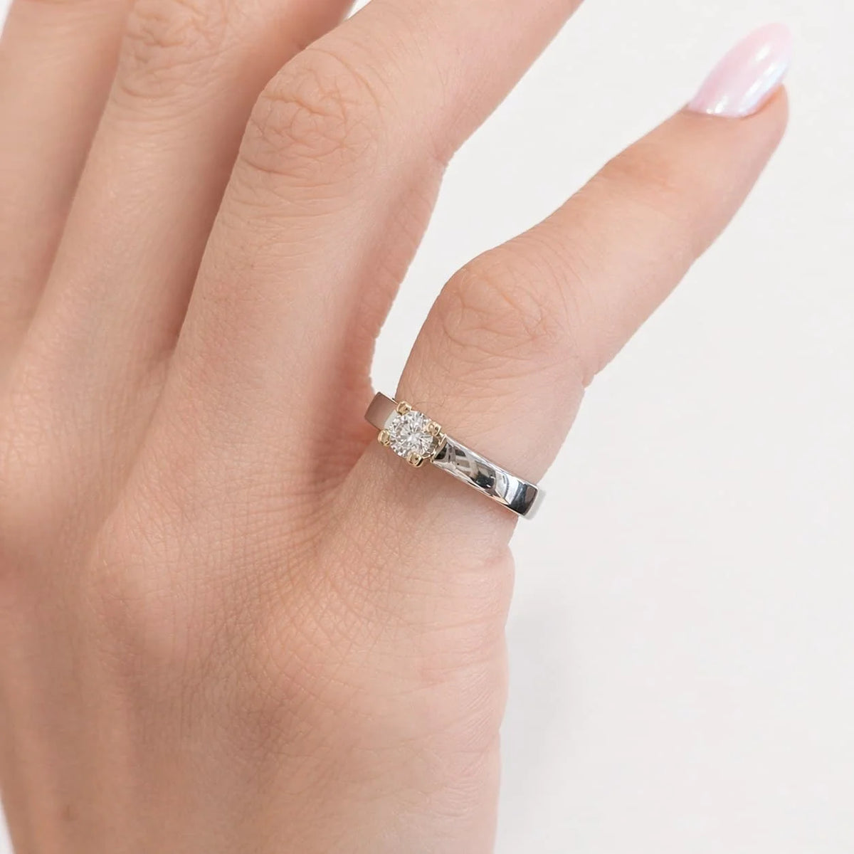 Bague Solitaire en or blanc, or jaune et diamant