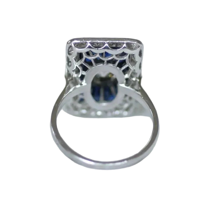 Bague Entourage en platine, saphirs et diamants