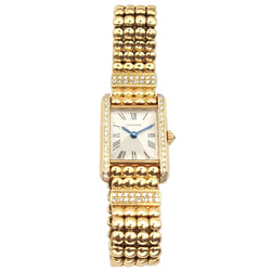Montre CARTIER "Tank Louis Cartier Mini" en or jaune et diamants