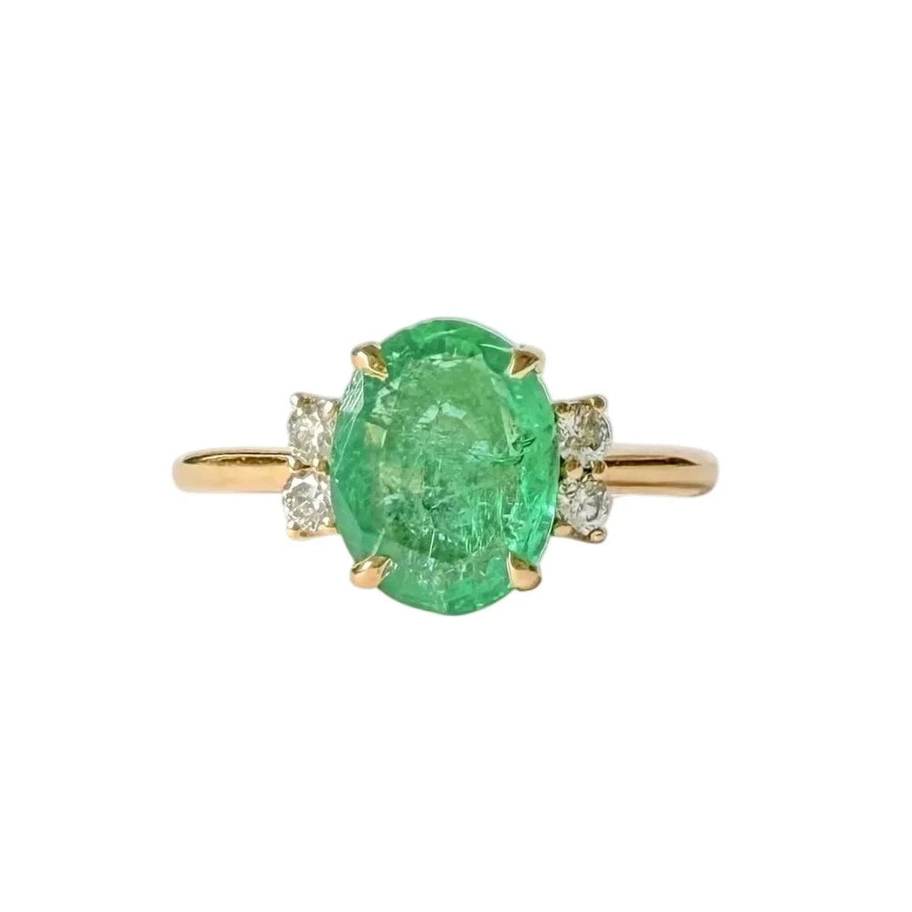 Bague Solitaire en or jaune, émeraude et diamants