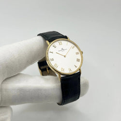 Montre BAUME & MERCIER "Classima" en or jaune, acier et cuir