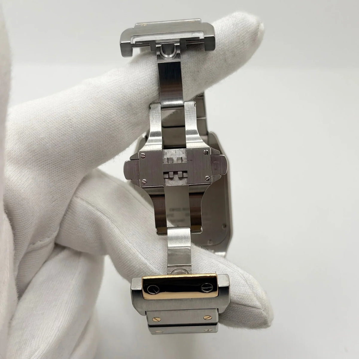 Montre CARTIER "Santos 100" en or jaune et acier inoxydable