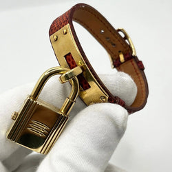Montre HERMÈS "Kelly" plaqué or, acier et cuir