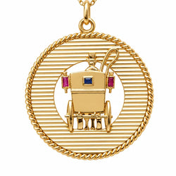 Pendentif MELLERIO en or jaune, saphir et rubis