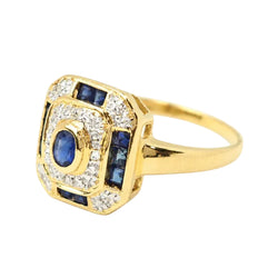 Bague Entourage en or jaune, saphirs et diamants