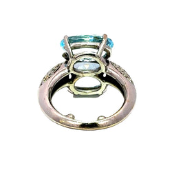 Bague Cocktail en or blanc, topazes et diamants