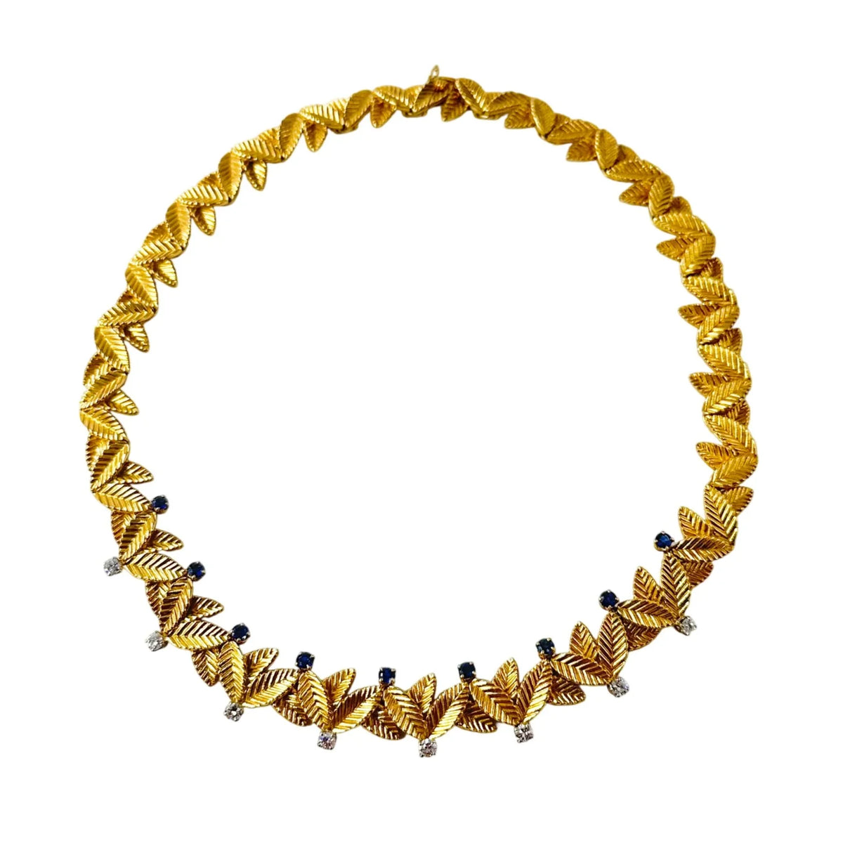 Collier Ras de Cou VAN CLEEF & ARPELS Feuilles en or jaune, saphirs et diamants