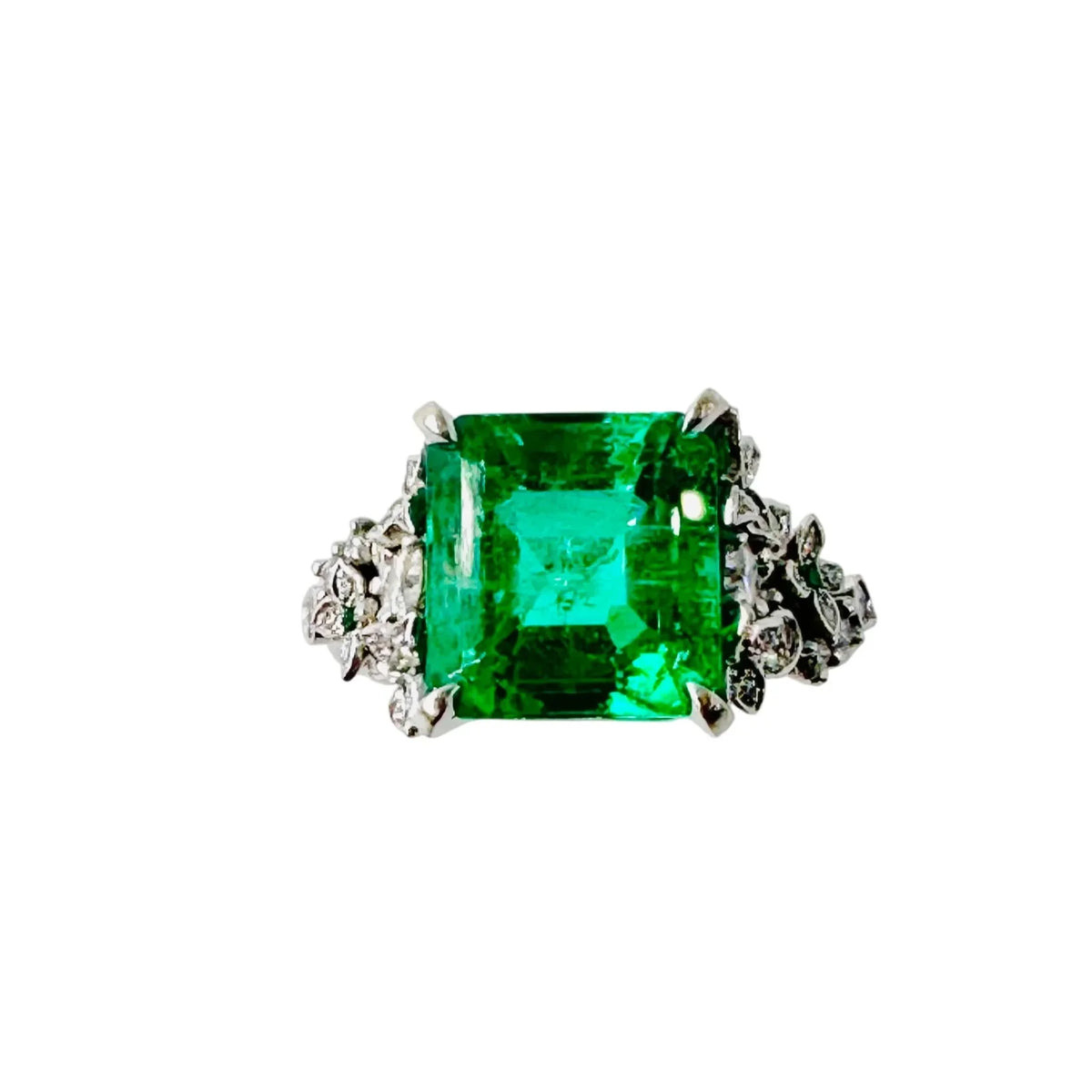 Bague Solitaire en or blanc, émeraude et diamants