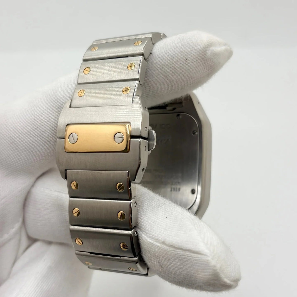Montre CARTIER "Santos 100" en or jaune et acier inoxydable