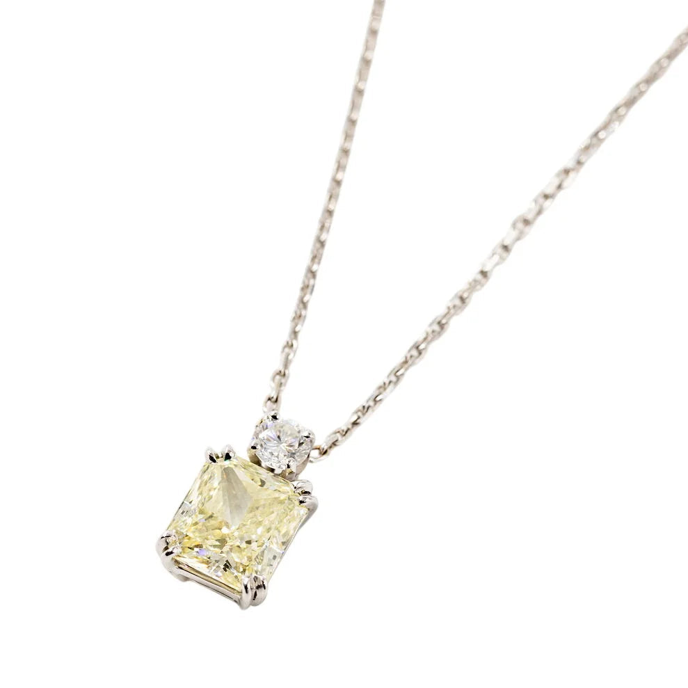 Collier Pendentif en or blanc, diamant fancy yellow et diamant