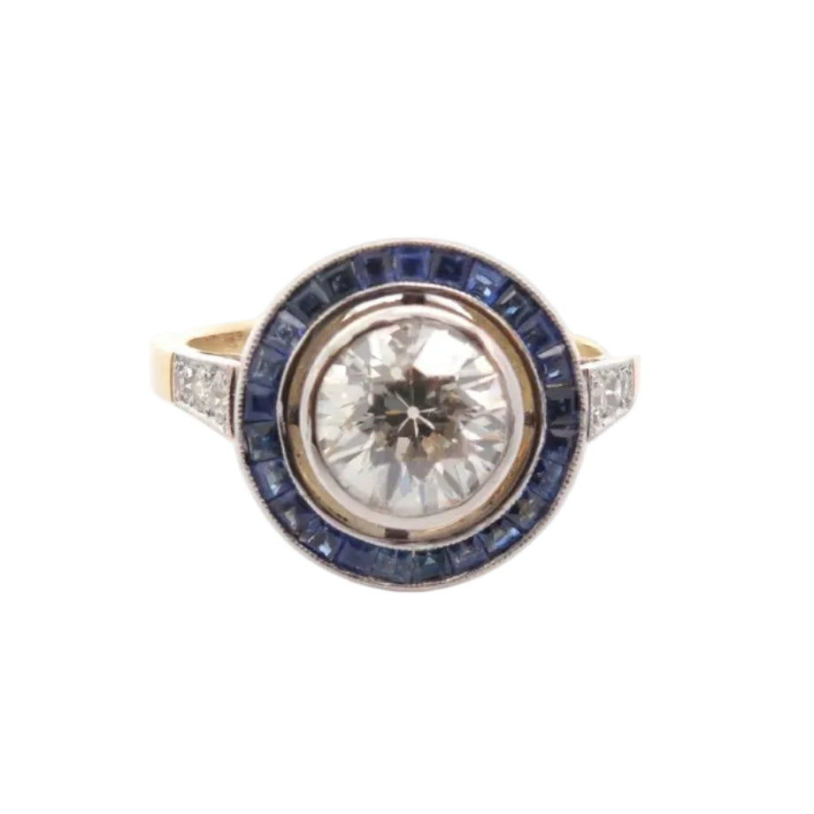 Bague Entourage en or jaune, platine, saphirs et diamants