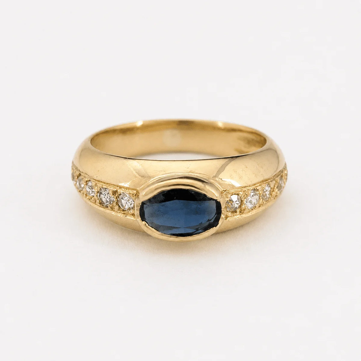 Bague Jonc en or jaune, saphir et diamants