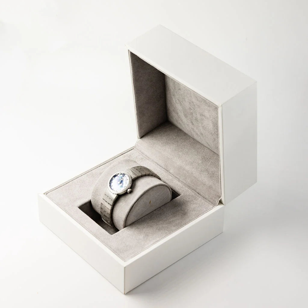 Montre de dame DIOR "La Baby D" en acier, nacre et diamants