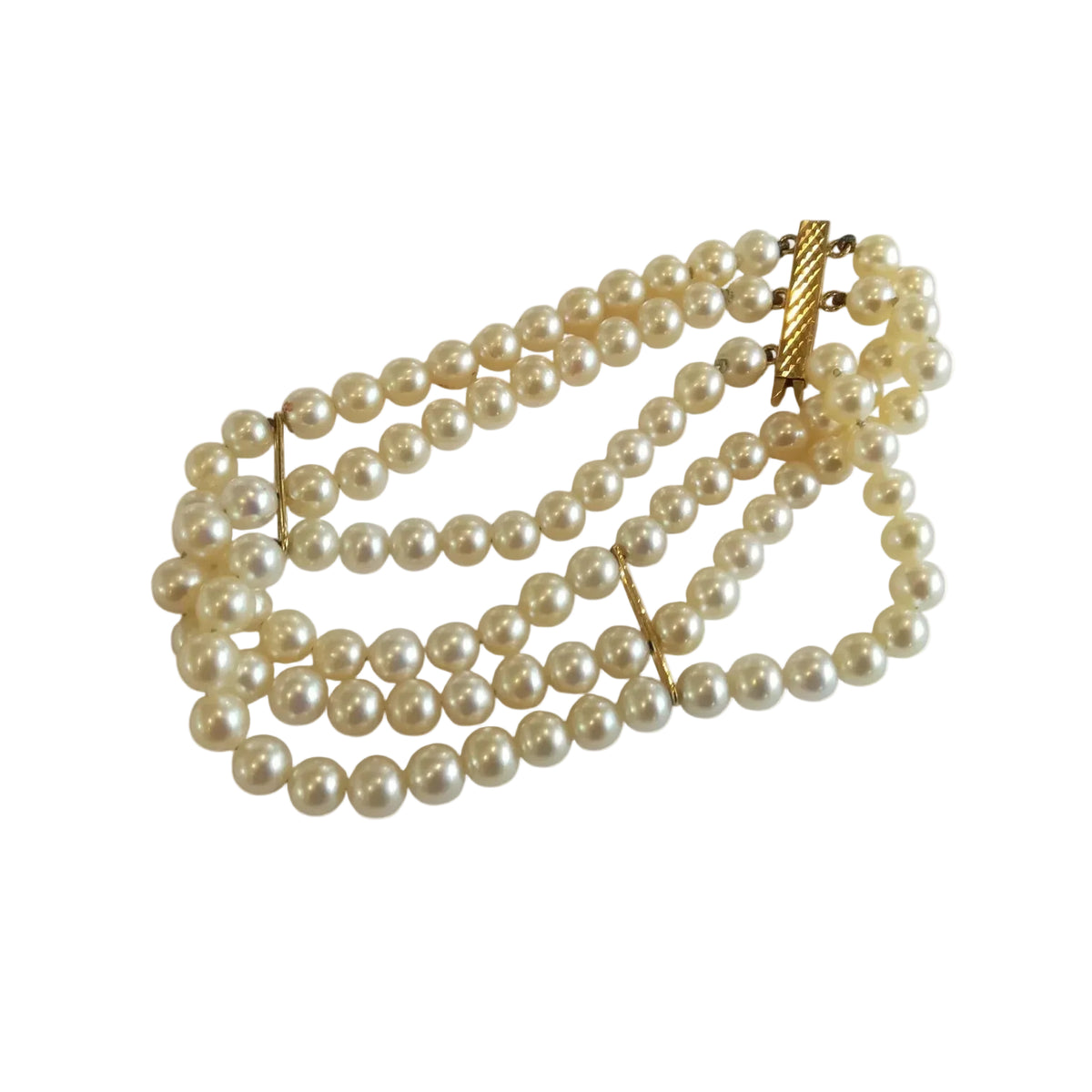 Bracelet en or jaune et perles