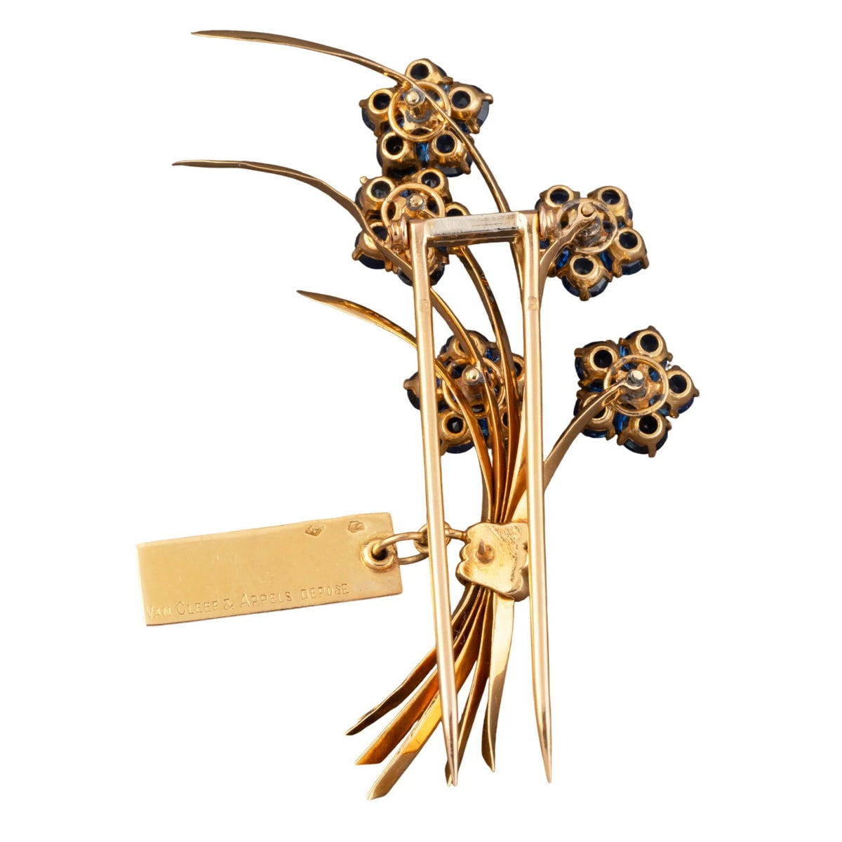 Broche Clip VAN CLEEF & ARPELS "Ne m'oubliez pas" en or jaune, saphirs et diamants