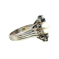Bague Marguerite en or, perle, saphirs et diamants