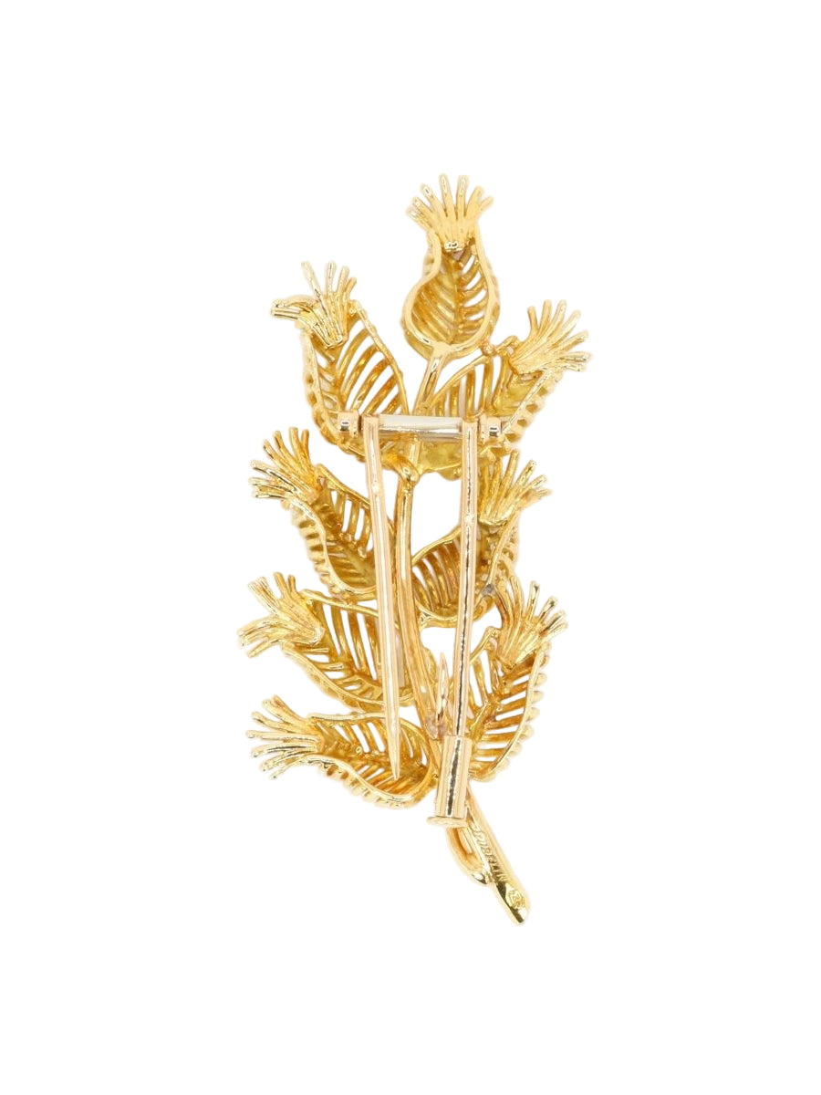 GUBELIN Broche feuille or rubis émeraudes - Castafiore