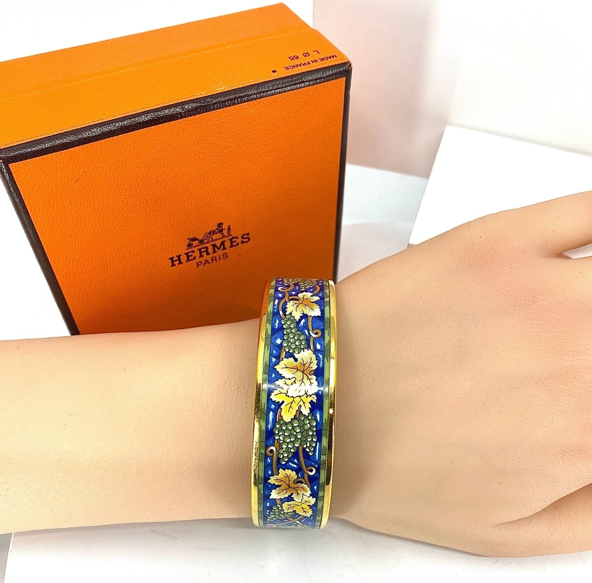 HERMÈS bracelet en métal doré et émail. - Castafiore