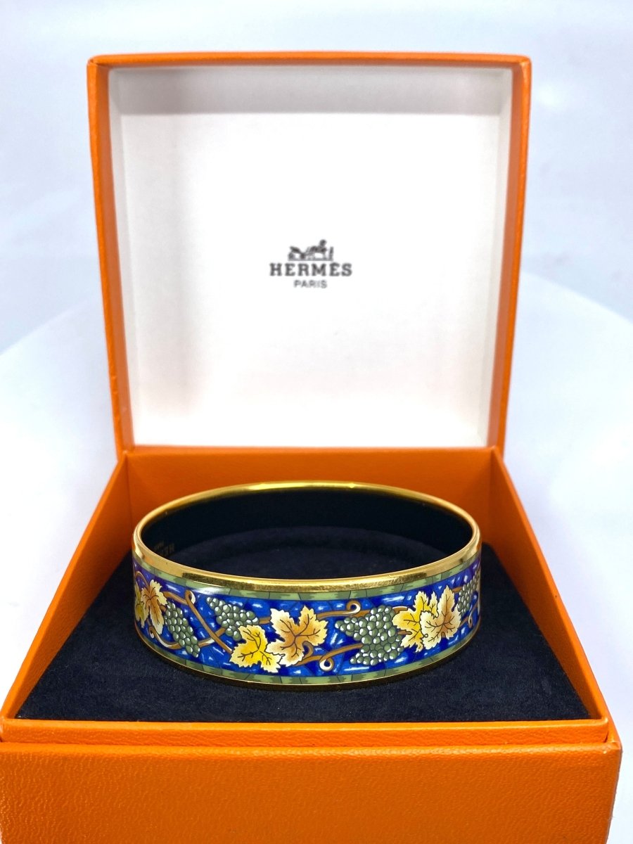 HERMÈS bracelet en métal doré et émail. - Castafiore