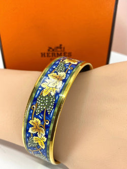 HERMÈS bracelet en métal doré et émail. - Castafiore