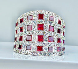 Importante bague bandeau coktail en or blanc 18 carats en rubis et diamants - Castafiore