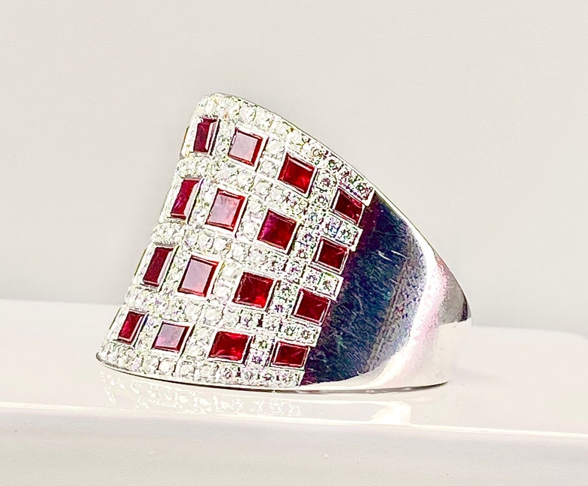 Importante bague bandeau coktail en or blanc 18 carats en rubis et diamants - Castafiore