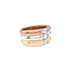 Bague Cartier, "Ellipse", trois ors et diamants.