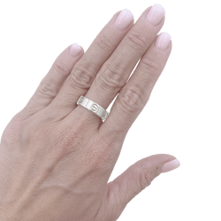 Bague Cartier "Love Classique", or blanc.