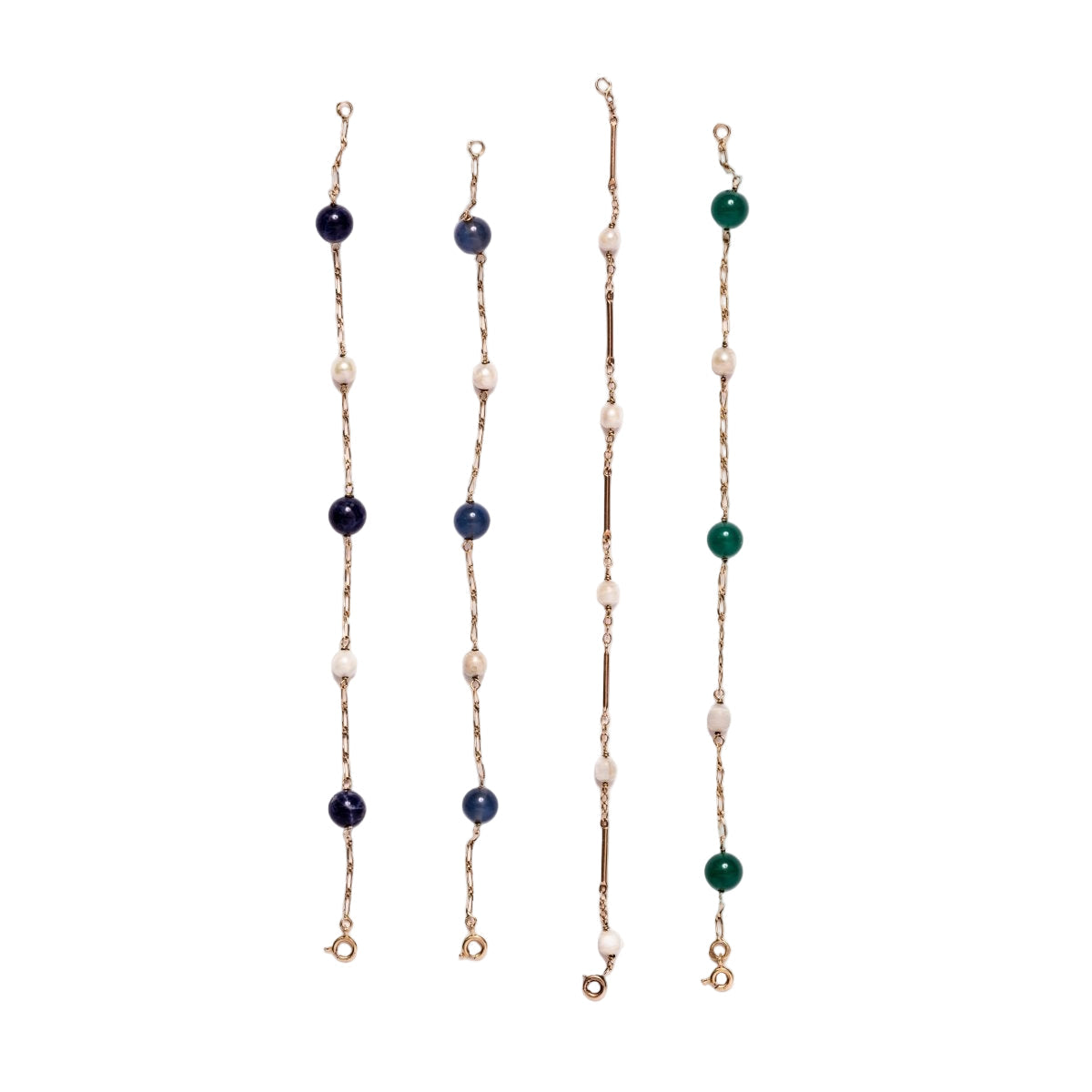 Lot de quatre bracelets en or jaune et perles - Castafiore