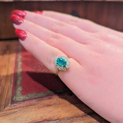 Marguerite en or jaune diamants et émeraude