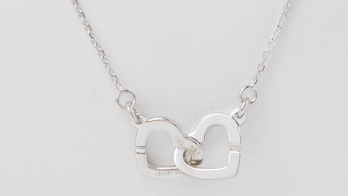 Collier double coeurs Dinh Van en or blanc