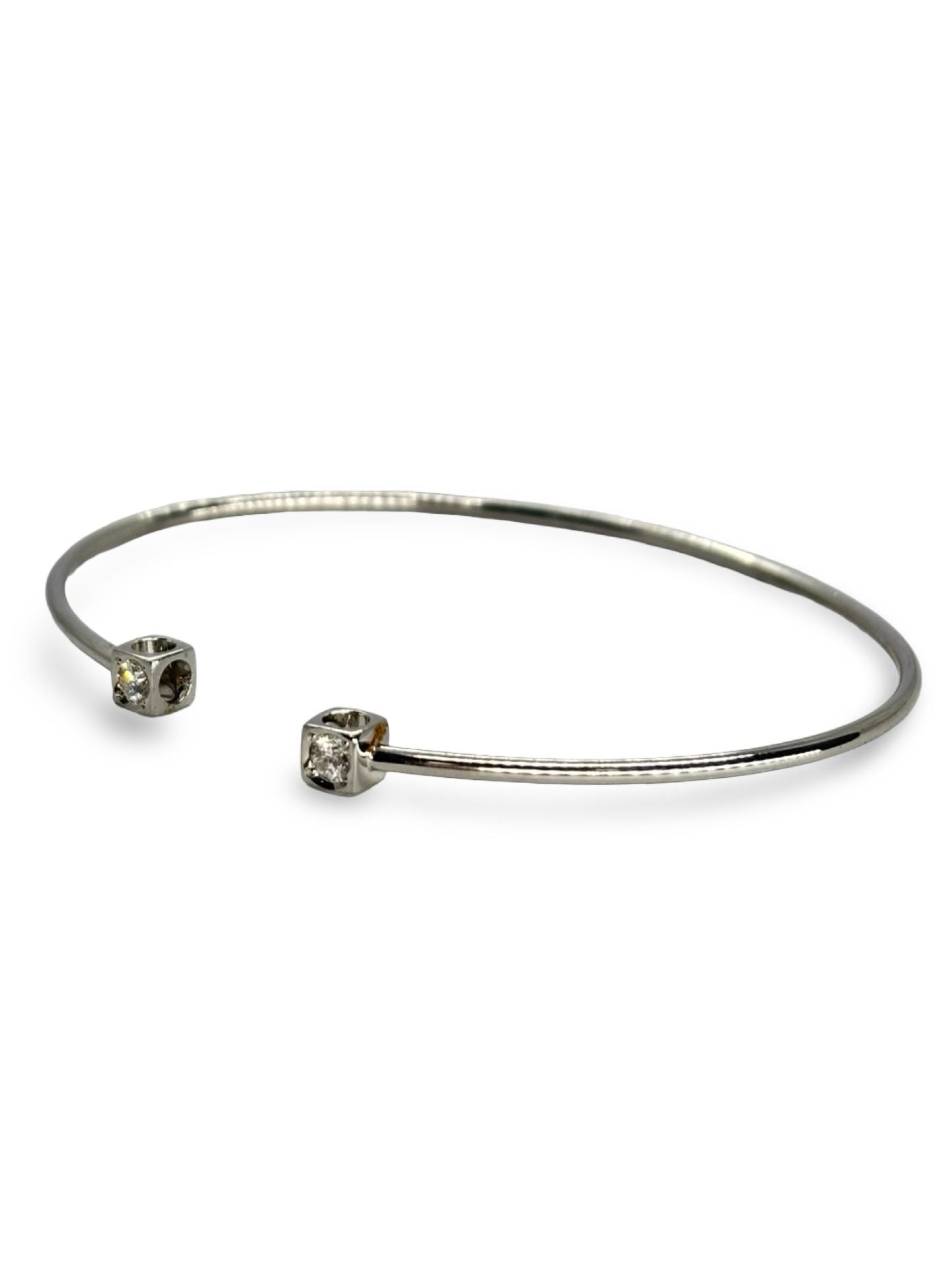 Bracelet Dinh Van "Le Cube" or blanc et diamants 0,24 ct