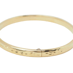 Bracelet jonc décor floral en or jaune