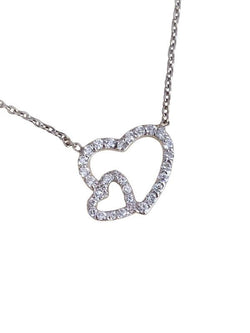 Collier cœur, en or blanc 18k et diamants
