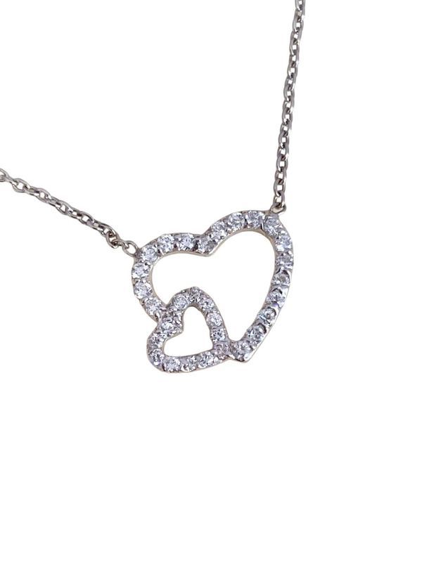 Collier cœur, en or blanc 18k et diamants