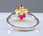 Bague marguerite en or 18 carats en rubis et diamants