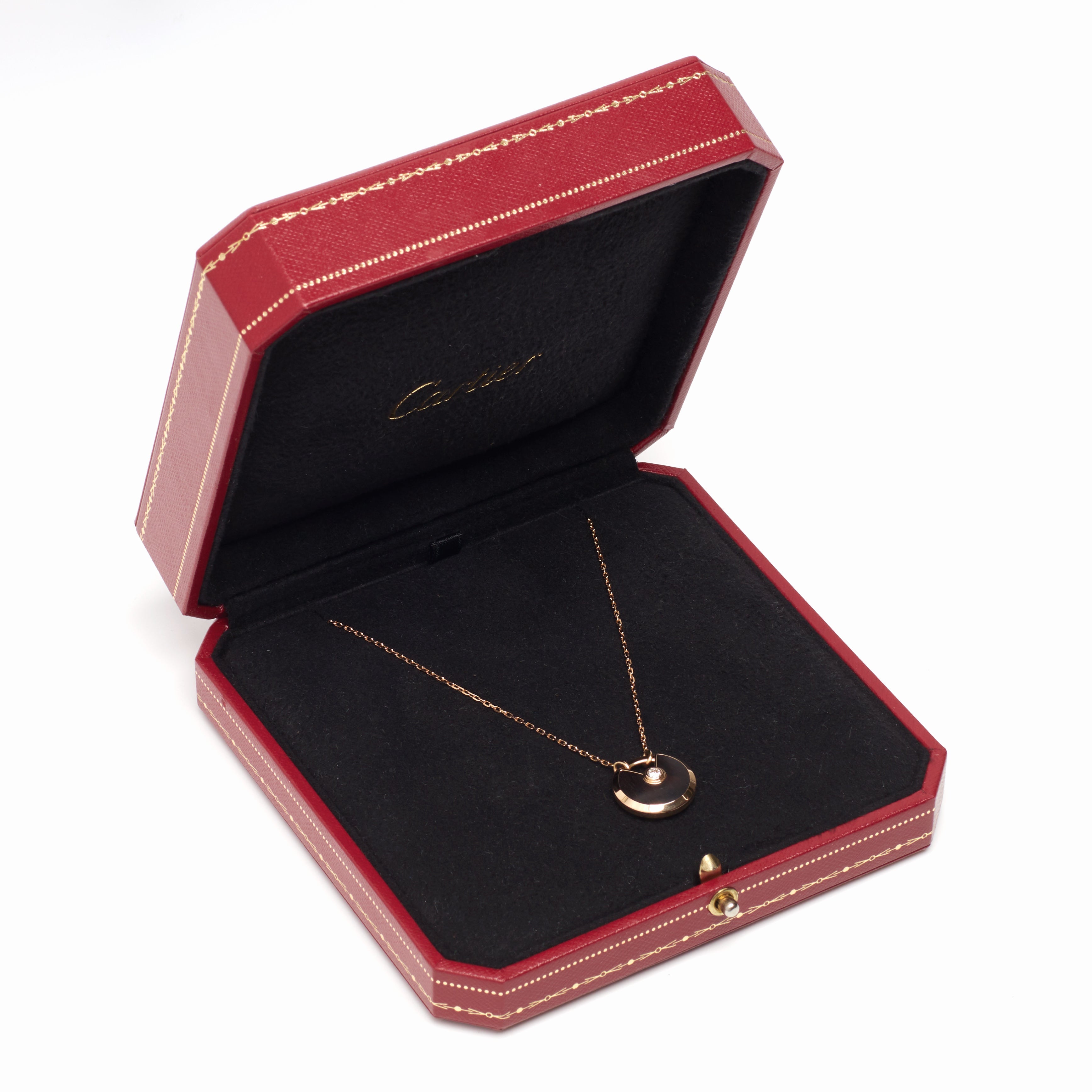 Sautoir Cartier Amulette PM en or rose et bois d'amourette