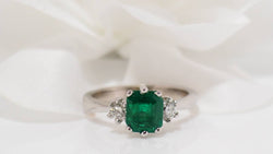 White gold, emerald and diamond ring 