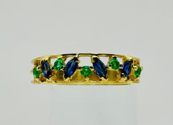 Bague en or jaune et émeraudes et saphirs