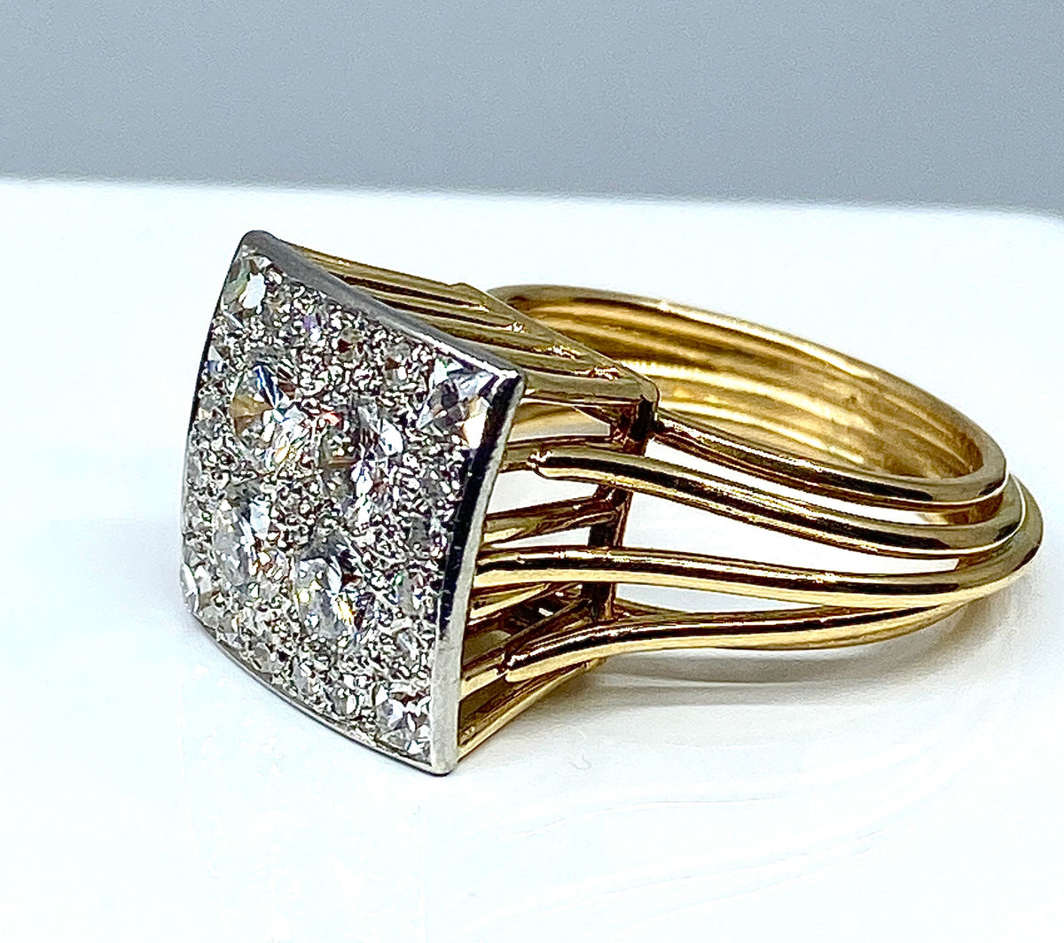 Bague en or jaune et or blanc 18 carats pavée de diamants