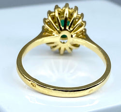 Bague marguerite en or 18 carats en émeraude et diamants