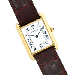 Montre CARTIER Tank Louis en or et saphir