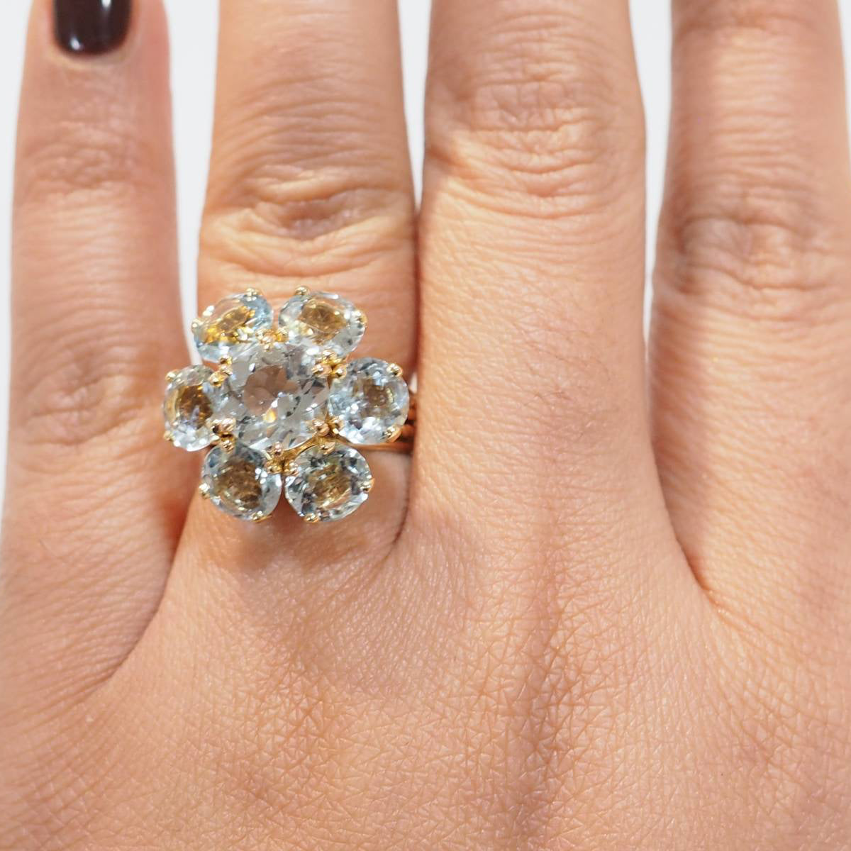 Bague fleur en or jaune et aigue-marine