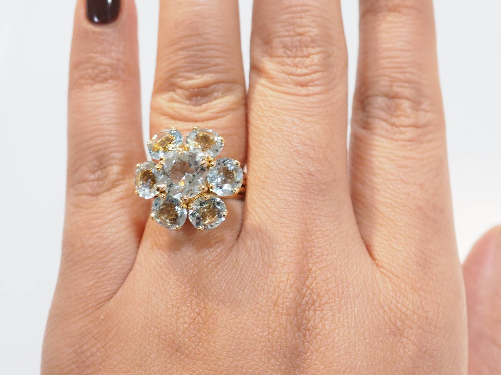 Bague fleur en or jaune et aigue-marine