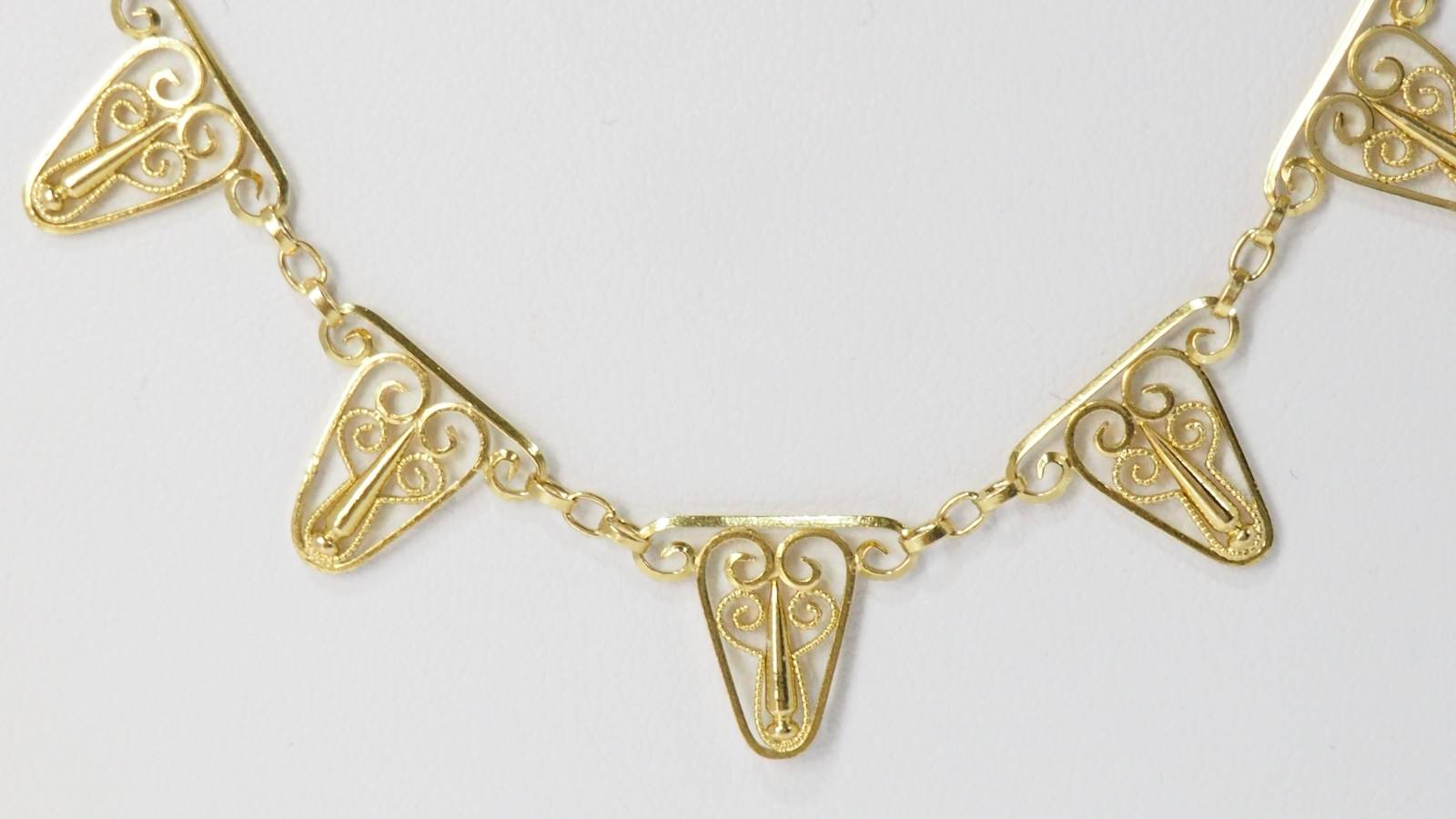 Collier draperie en or filigrané