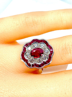 White gold ruby ​​and diamond daisy ring