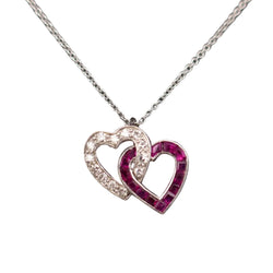 Pendentif coeurs entrelacés en or blanc et diamants, rubis
