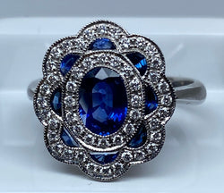18k gold sapphire and diamond daisy ring