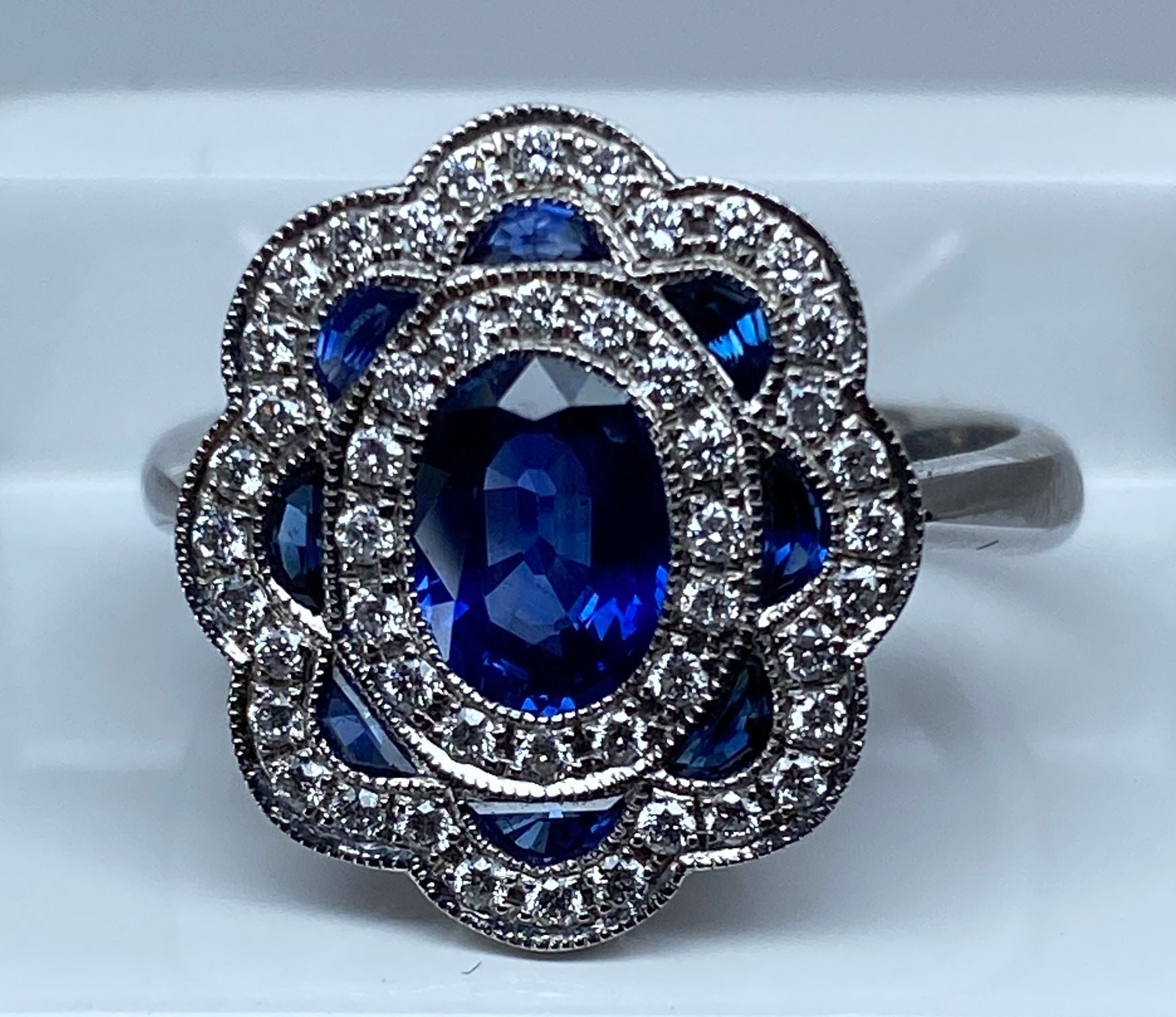 18k gold sapphire and diamond daisy ring