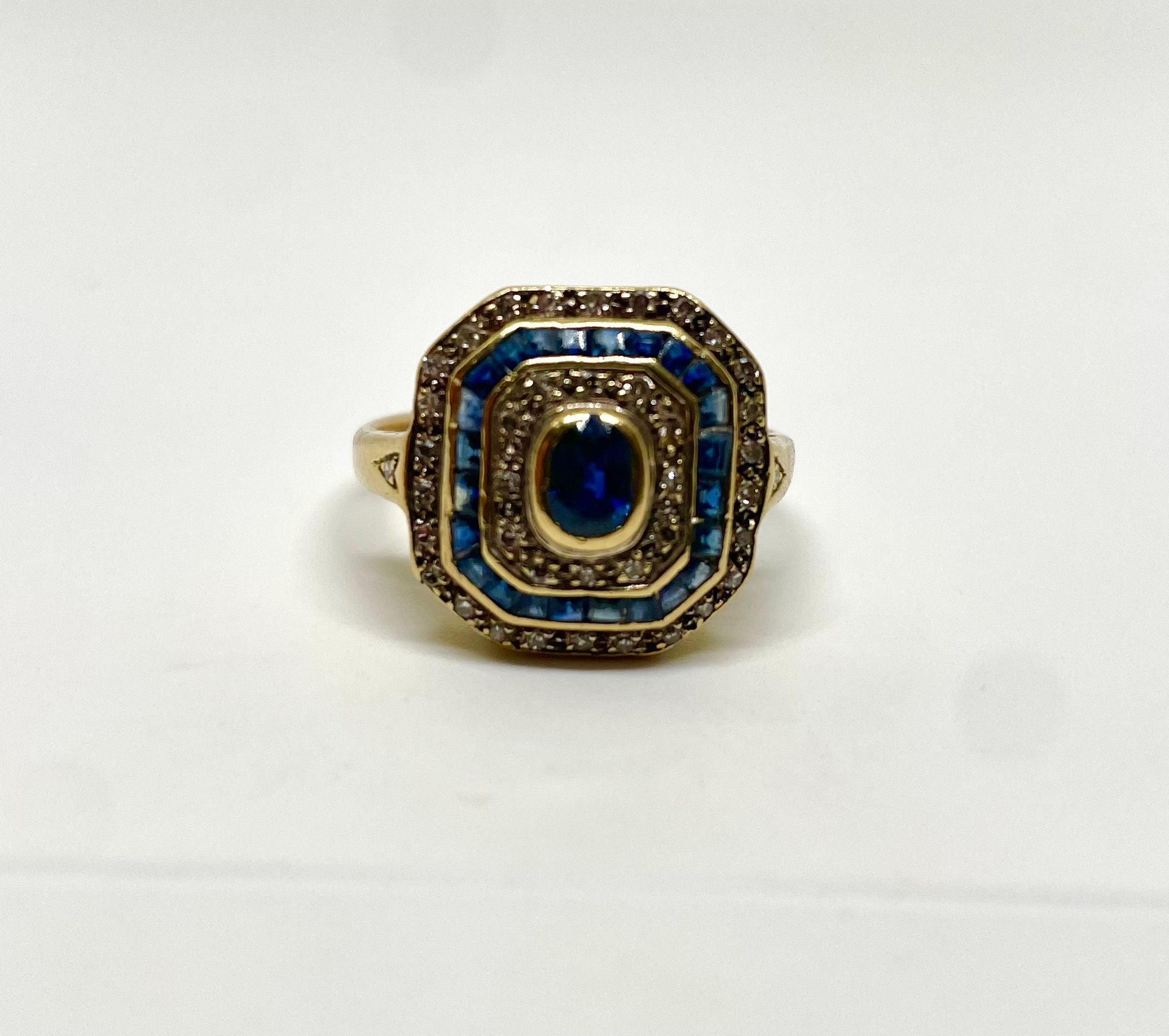 Bague art déco or jaune saphirs et diamants